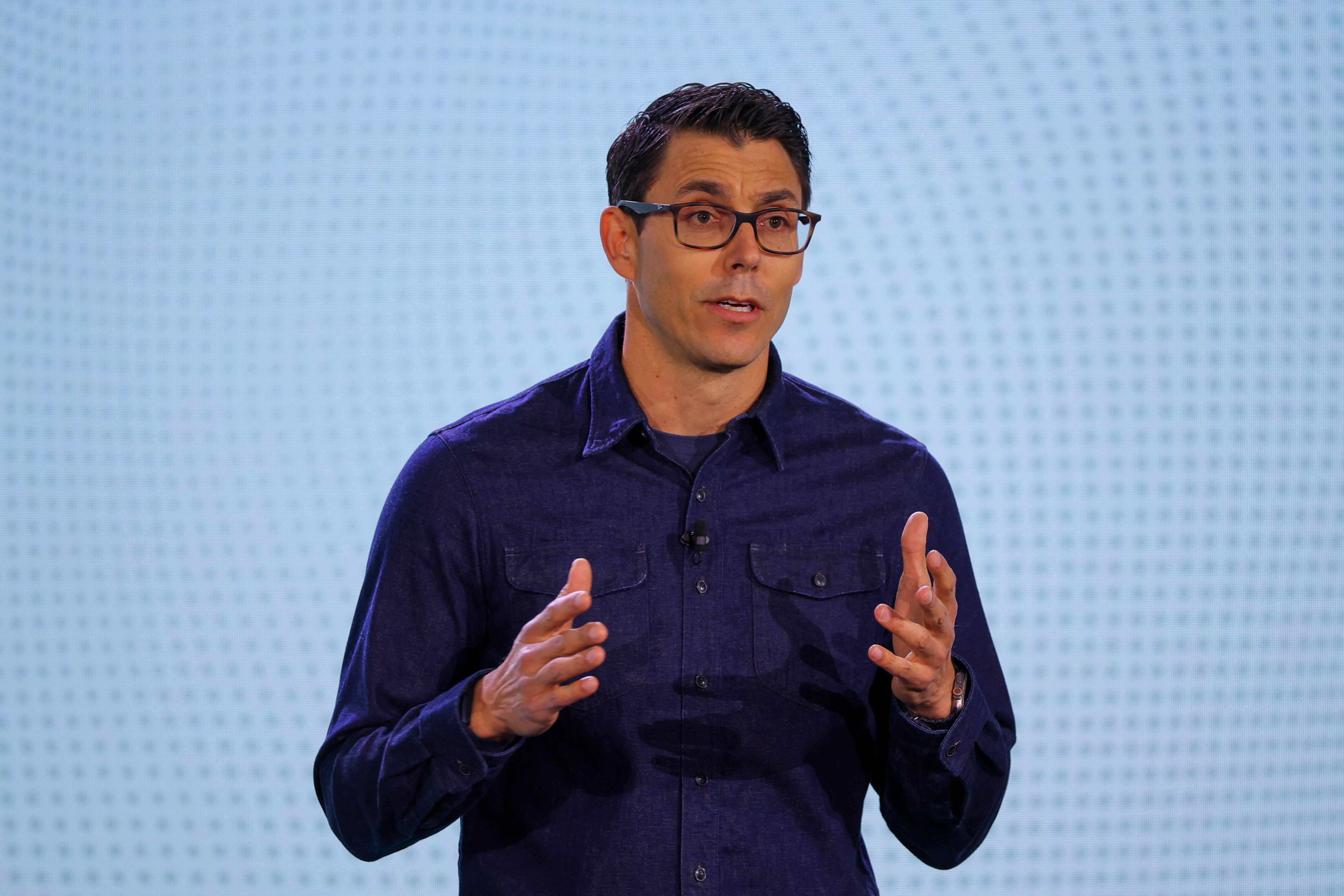 Rivian CEO Discusses Uber Partnership and Future of AI in Mobility